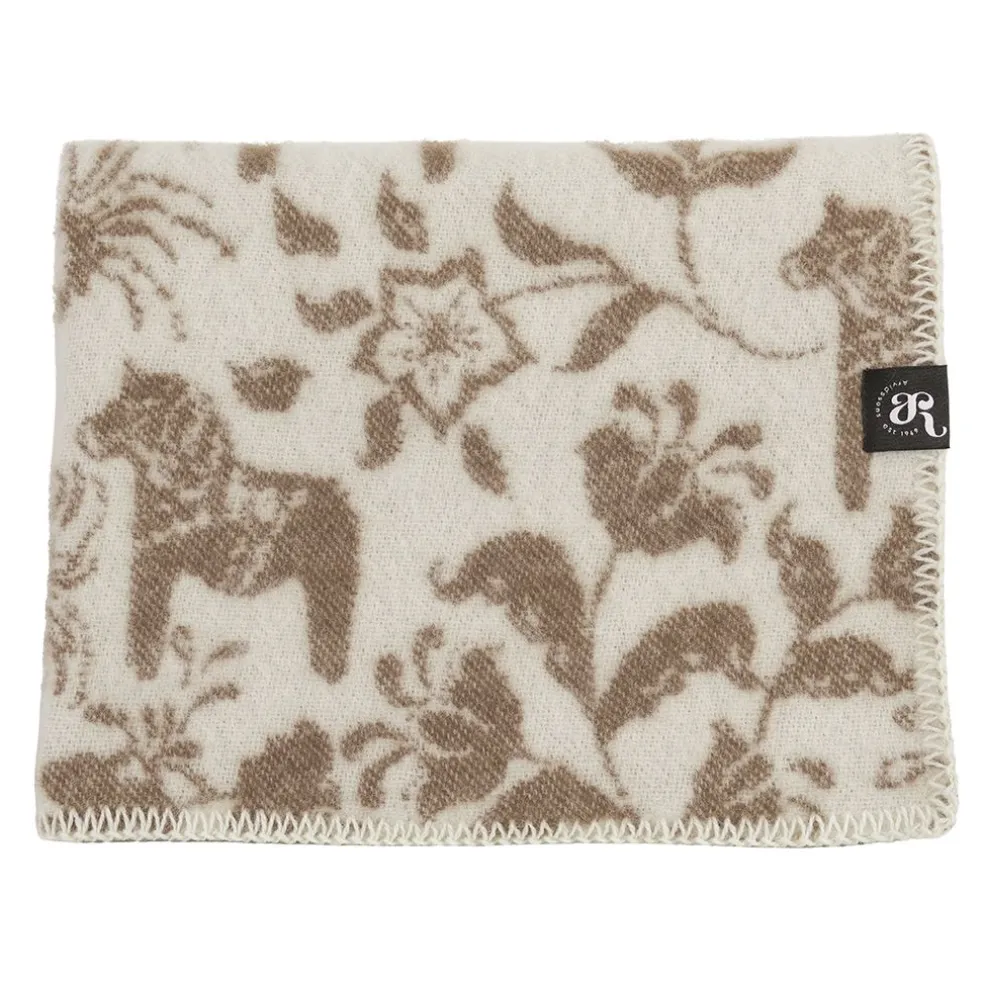 Barnfilt Leksand beige 65x95cm med dalahästar och kurbits