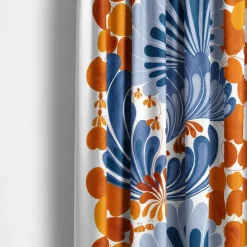 Lisette blå/orange gardiner - mönster i retrostil