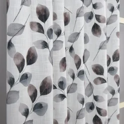 Odelia gardin – elegant bladmönstrad gardin i mjuka naturtoner