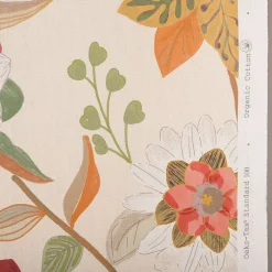 Paths tyg - ett tyg med blomster i varm färgskala